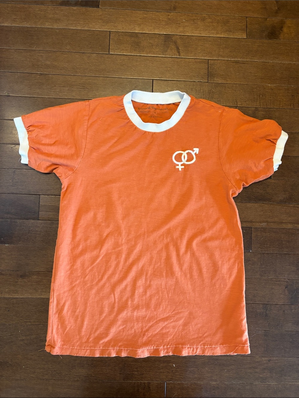 Stoned Immaculate Orange Ringer Tee with White Trim and Interlocked Symbol